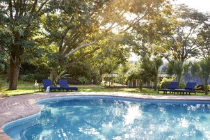 2 outdoor pools, pool umbrellas, sun loungers
