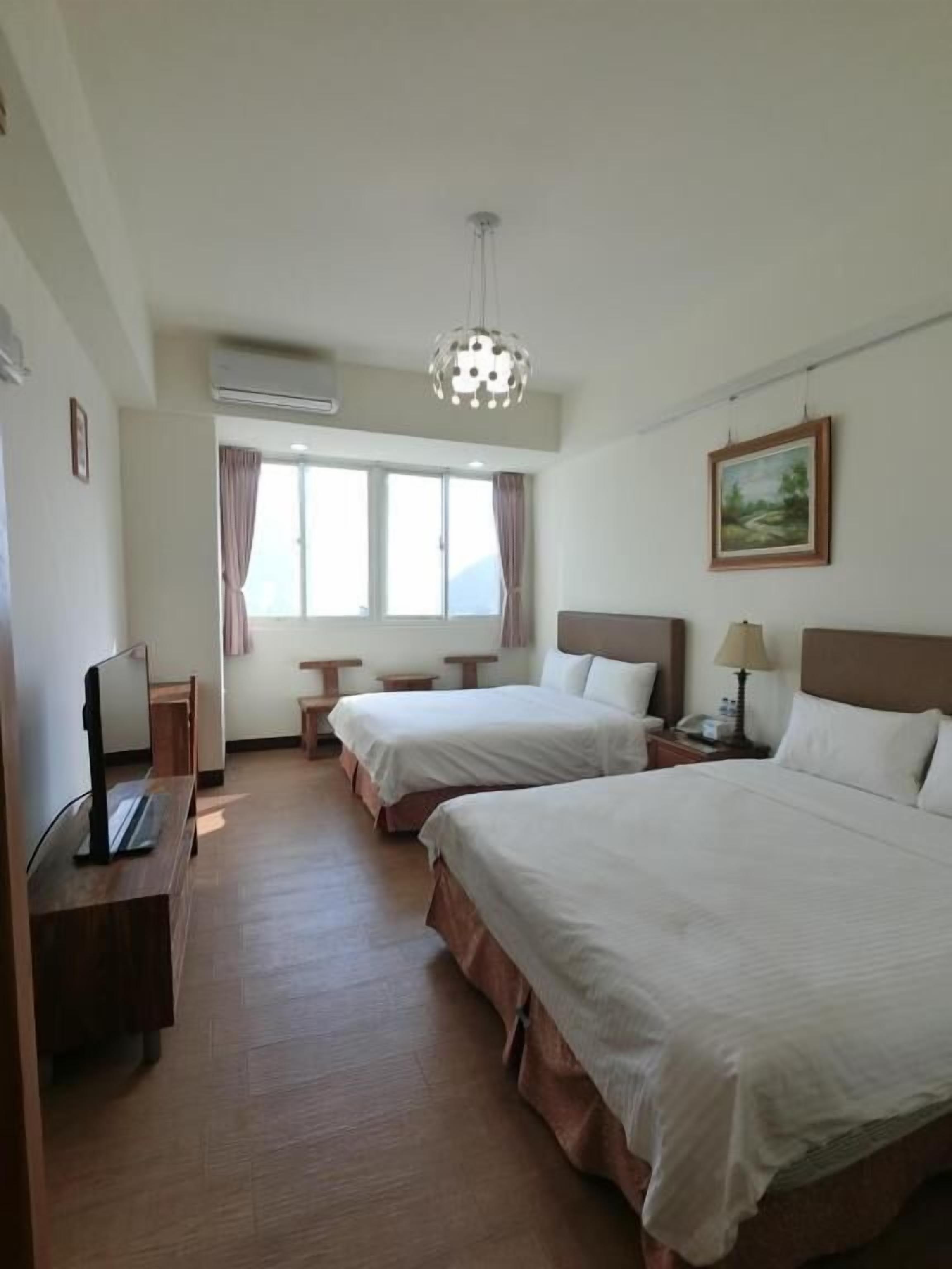 quadruple room | blackout curtains, free wifi, bed sheets