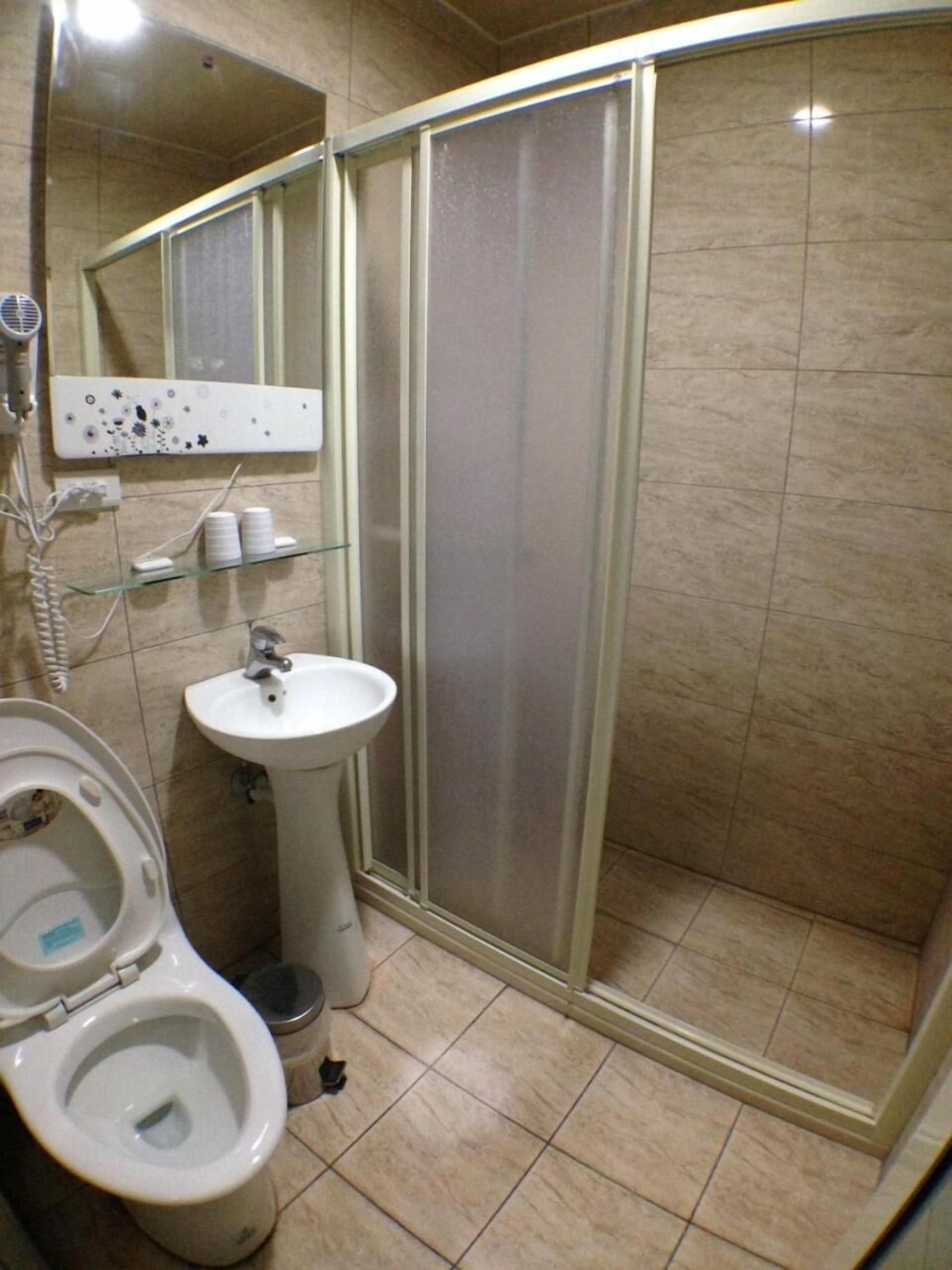 shower, free toiletries, hair dryer, slippers