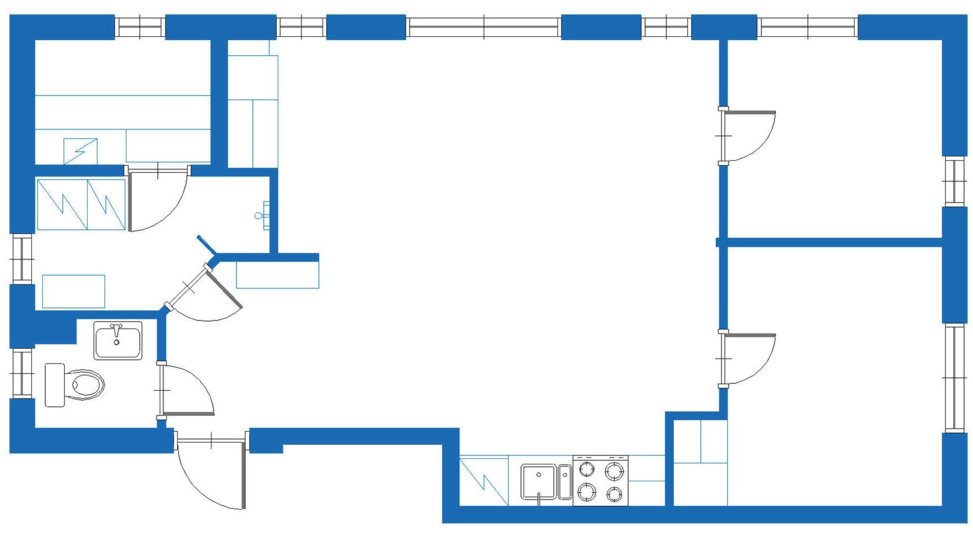 A floor plan with a kitchen area, a bathroom, and a dining space.