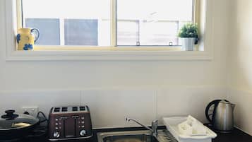 Fridge, microwave, coffee/tea maker, electric kettle