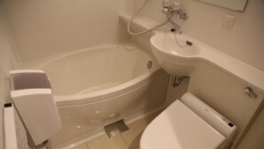 A bathroom with a bathtub, a sink, and a toilet. - Hotel Excellence Kyoto Ekimae (Kyoto)