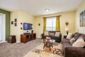 Condo | Living room | Flat-screen TV - Premium Lake View Condo [cdc Compliant] - 1005 (Orlando)