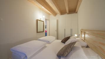 Apartment, 2 Bedrooms, Garden Area (Marocche) | 2 bedrooms, iron/ironing board, free cots/infant beds, free WiFi