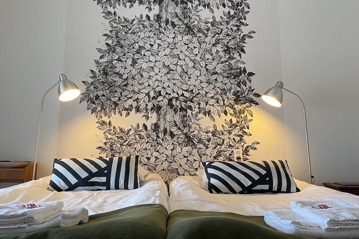 basic twin room, 2 single beds, non smoking, shared bathroom | 1 bedroom, individually decorated, individually furnished