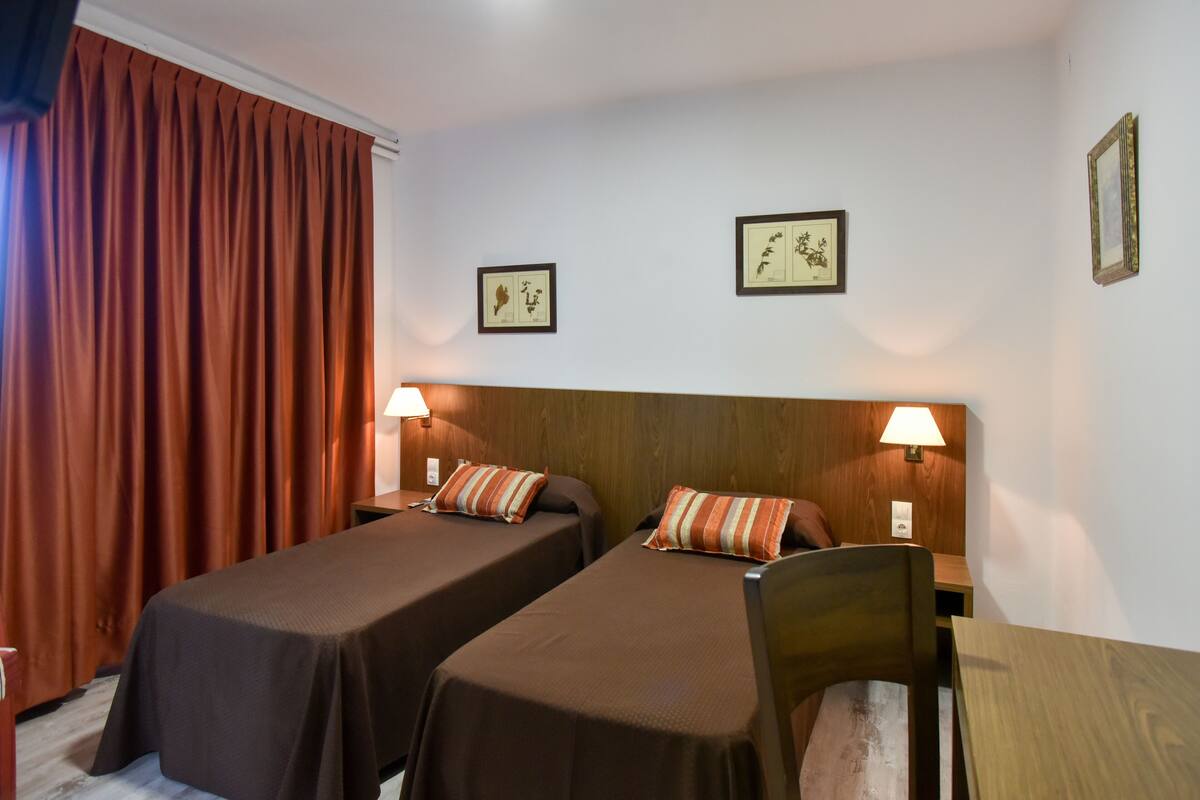 Desk, rollaway beds (surcharge), WiFi (free)