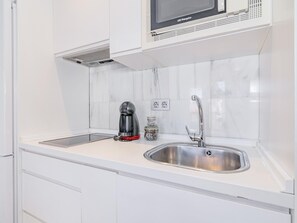 Fridge, microwave, coffee/tea maker, toaster