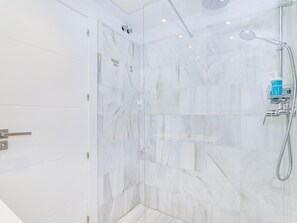 Bathtub, hair dryer, towels