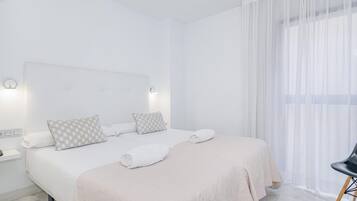 2 slaapkamers, een strijkplank/strijkijzer, internet, beddengoed