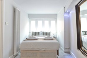 Appartement, 2 chambres | 2 chambres, rideaux d’obscurcissement, fer et planche à repasser