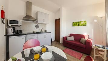 Apartment, 1 Bedroom, Sea View | Private kitchen | Full-size fridge, microwave, electric kettle, toaster