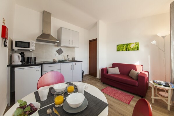 Apartment, 1 Bedroom, Sea View | Private kitchen | Full-sized fridge, microwave, electric kettle, toaster