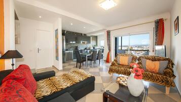 Apartment, 2 Bedrooms, Sea View | Living area | Flat-screen TV