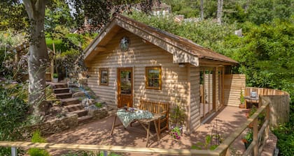 Porthole Log Cabin