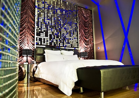 Superior Room | Minibar, individually decorated, desk, blackout drapes