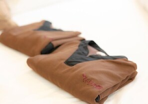Soft, casual wear with a delicate pink embroidered detail.