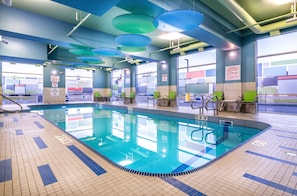 Indoor pool, open 8:00 AM to 10:00 PM, pool loungers