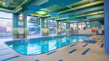 Indoor pool, open 8:00 AM to 10:00 PM, pool loungers