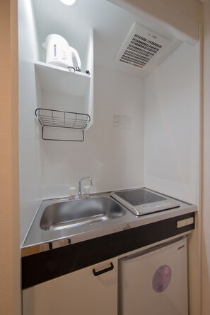 Fridge, stovetop, cookware/dishes/utensils