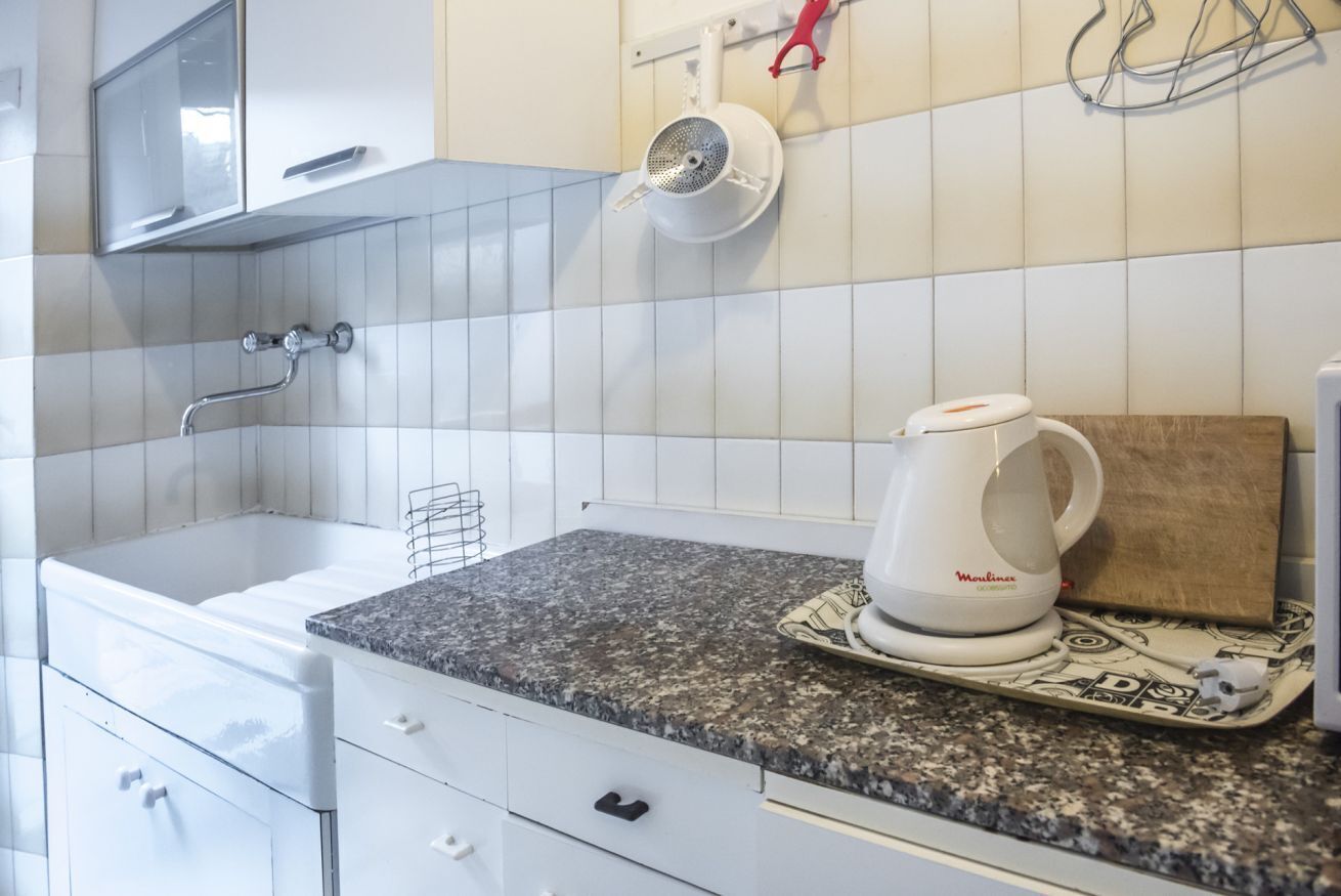 Fridge, oven, dining tables