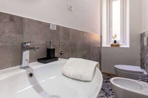 Shower, free toiletries, hair dryer, towels
