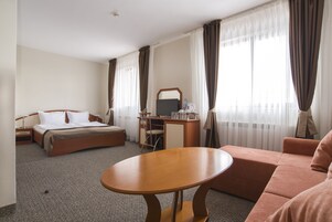 Large Family Room | Desk, blackout drapes, soundproofing, iron/ironing board