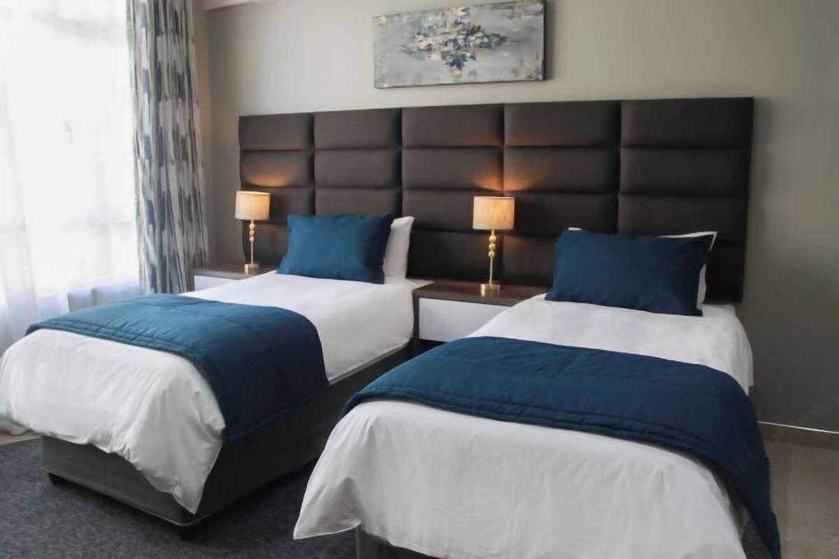 Premium bedding, pillow-top beds, blackout curtains, soundproofing