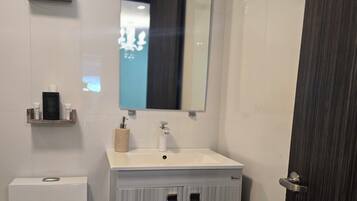 Shower, towels, soap, shampoo