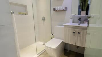 Shower, towels, soap, shampoo