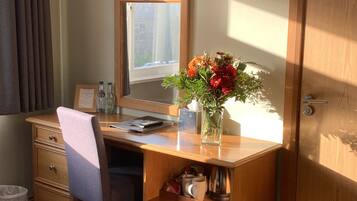 Desk, blackout drapes, soundproofing, iron/ironing board