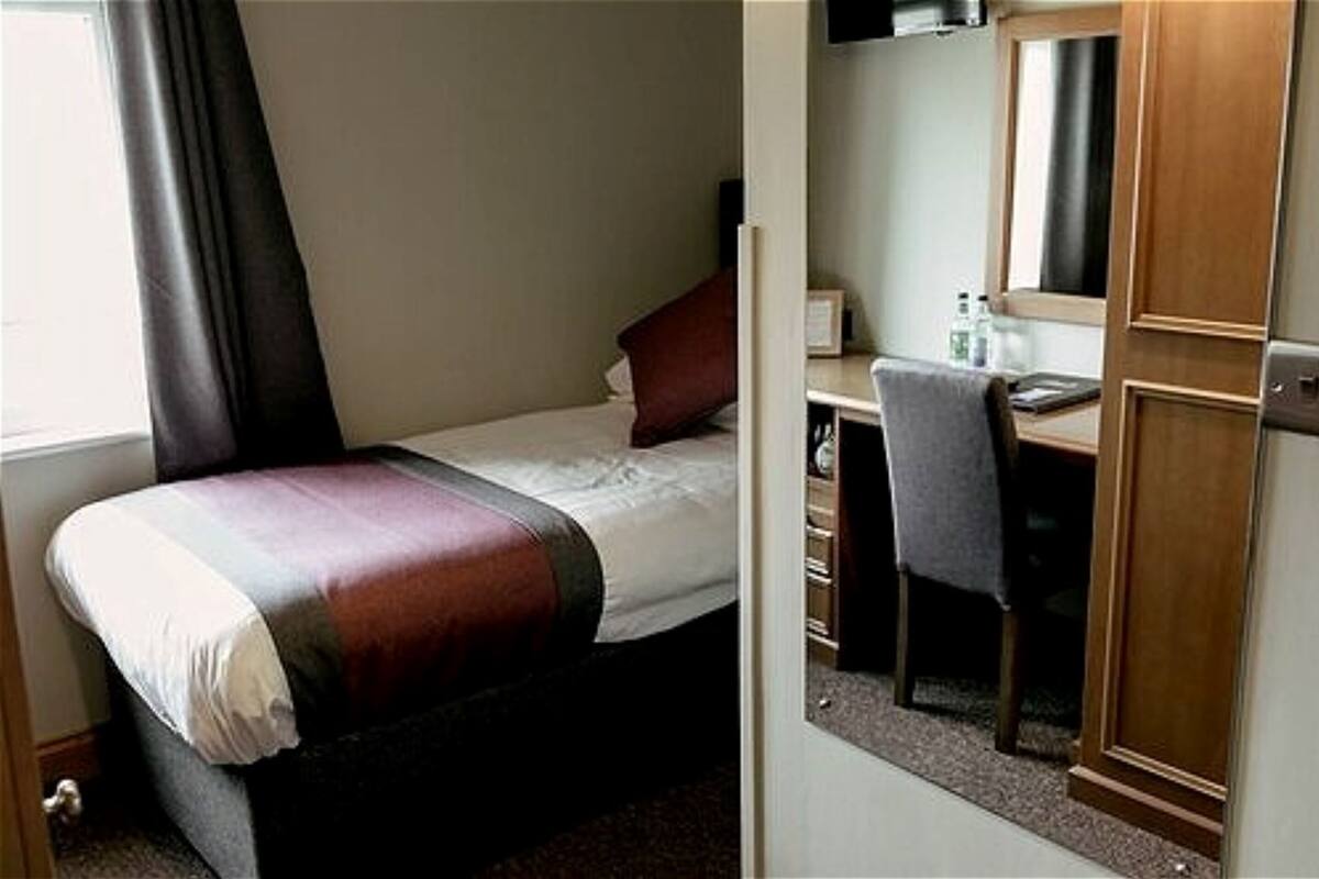 Desk, blackout drapes, soundproofing, iron/ironing board