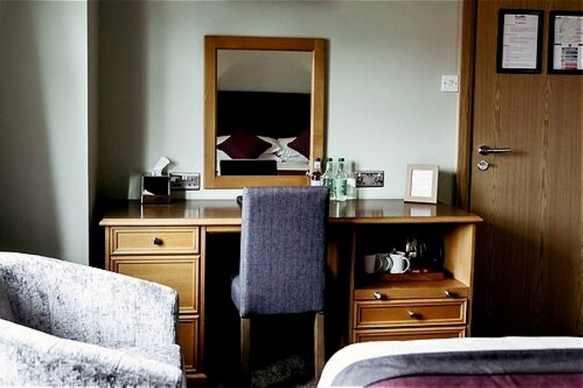 Desk, blackout drapes, soundproofing, iron/ironing board