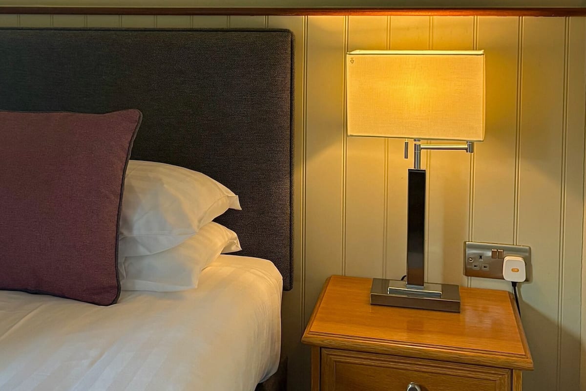 Desk, blackout curtains, soundproofing, iron/ironing board