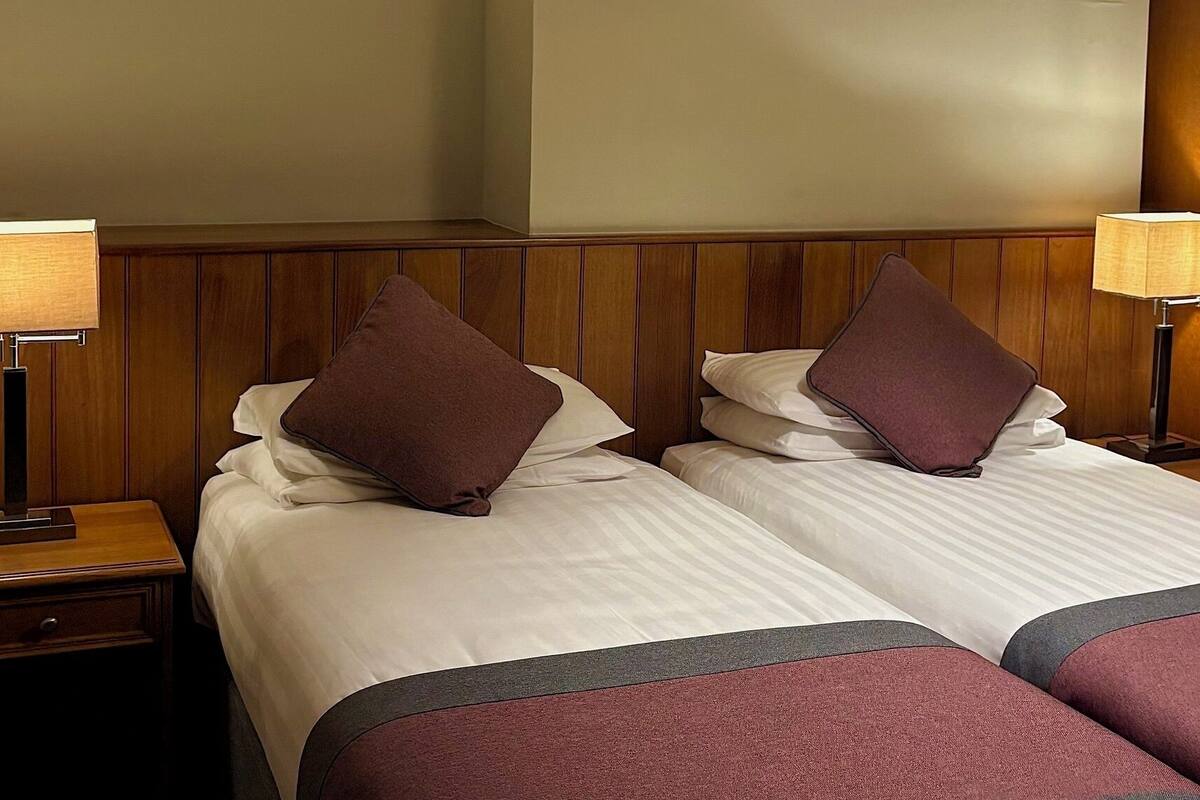 Desk, blackout curtains, soundproofing, iron/ironing board