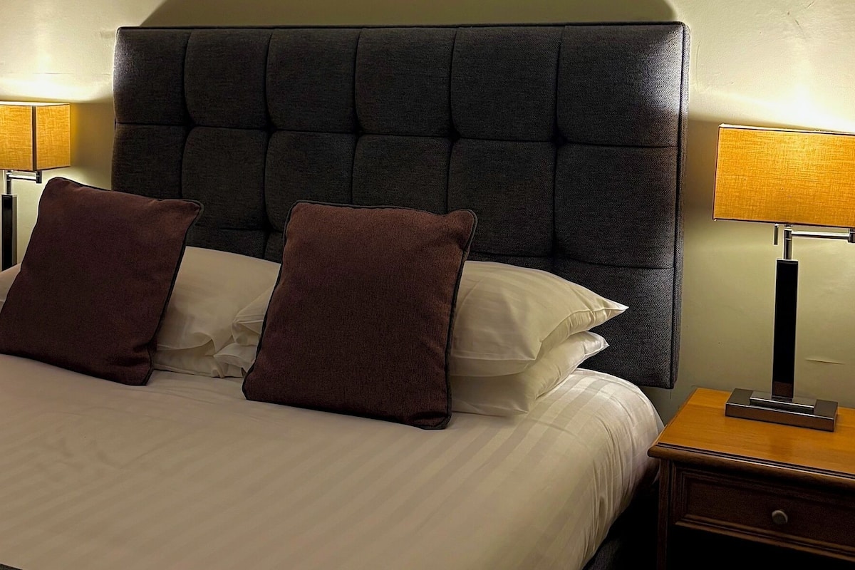 Desk, blackout curtains, soundproofing, iron/ironing board