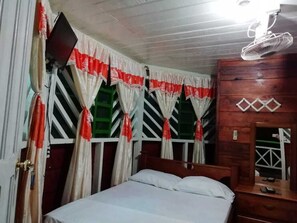 Family Triple Room, Private Bathroom | Bed sheets - Ecocabañas Manguare (Puerto Nariño)
