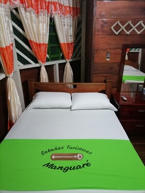 Family Triple Room, Private Bathroom | Bed sheets - Ecocabañas Manguare (Puerto Nariño)