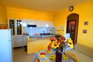 Apartment, 2 Bedrooms (Appartamento  7) | Private kitchen | Full-size fridge, oven, stovetop, espresso maker - Casa Vacanze del Sole (Ricadi)