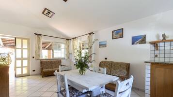 Villa, 2 Bedrooms (Villa Aurelia) | Living area | Flat-screen TV