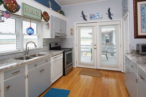 Fridge, microwave, oven, dishwasher - Charming water/marsh front home w/floating dock, grill-family fishing, crabbing-waiting for you (North Myrtle Beach)