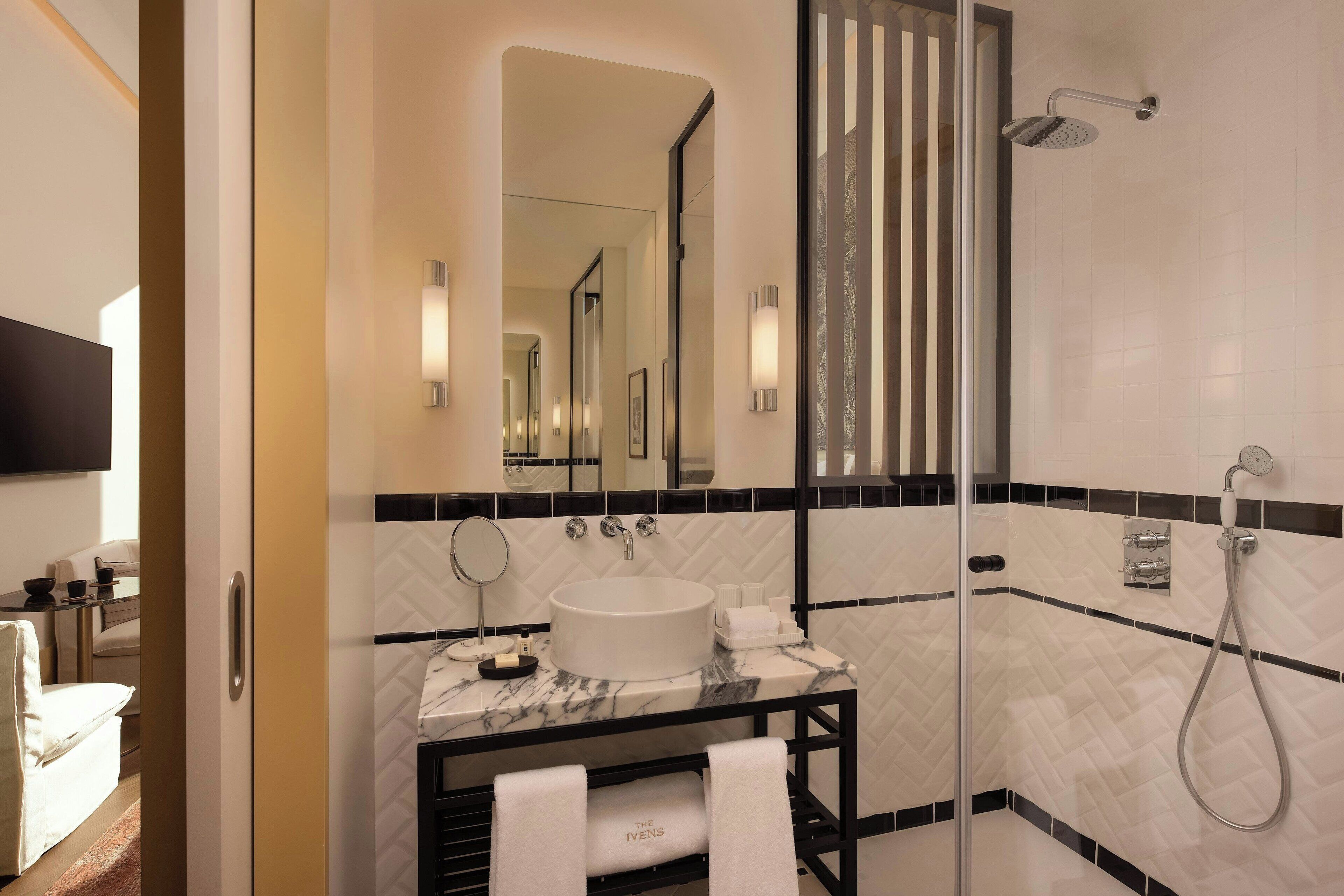 hair dryer, slippers, towels, soap