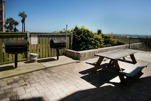 Enjoy al fresco dining on the patio, where a picnic table and barbecue grills await.