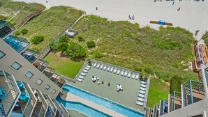 A high-rise hotel with a rooftop pool, a beach area, and a boardwalk. - Perfect for families or groups looking for an upscale beachfront experience. (North Myrtle Beach)