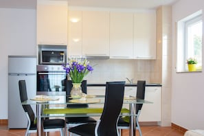 Deluxe Apartment | Private kitchen | Full-sized fridge, microwave, stovetop, coffee/tea maker - Apartmani Mijo (Trogir)