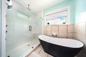 Bathtub, hair dryer, shampoo