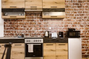 Premium-Vierbettzimmer, Erdgeschoss | Eigene Küche | Kühlschrank, Mikrowelle, Ofen, Herdplatte