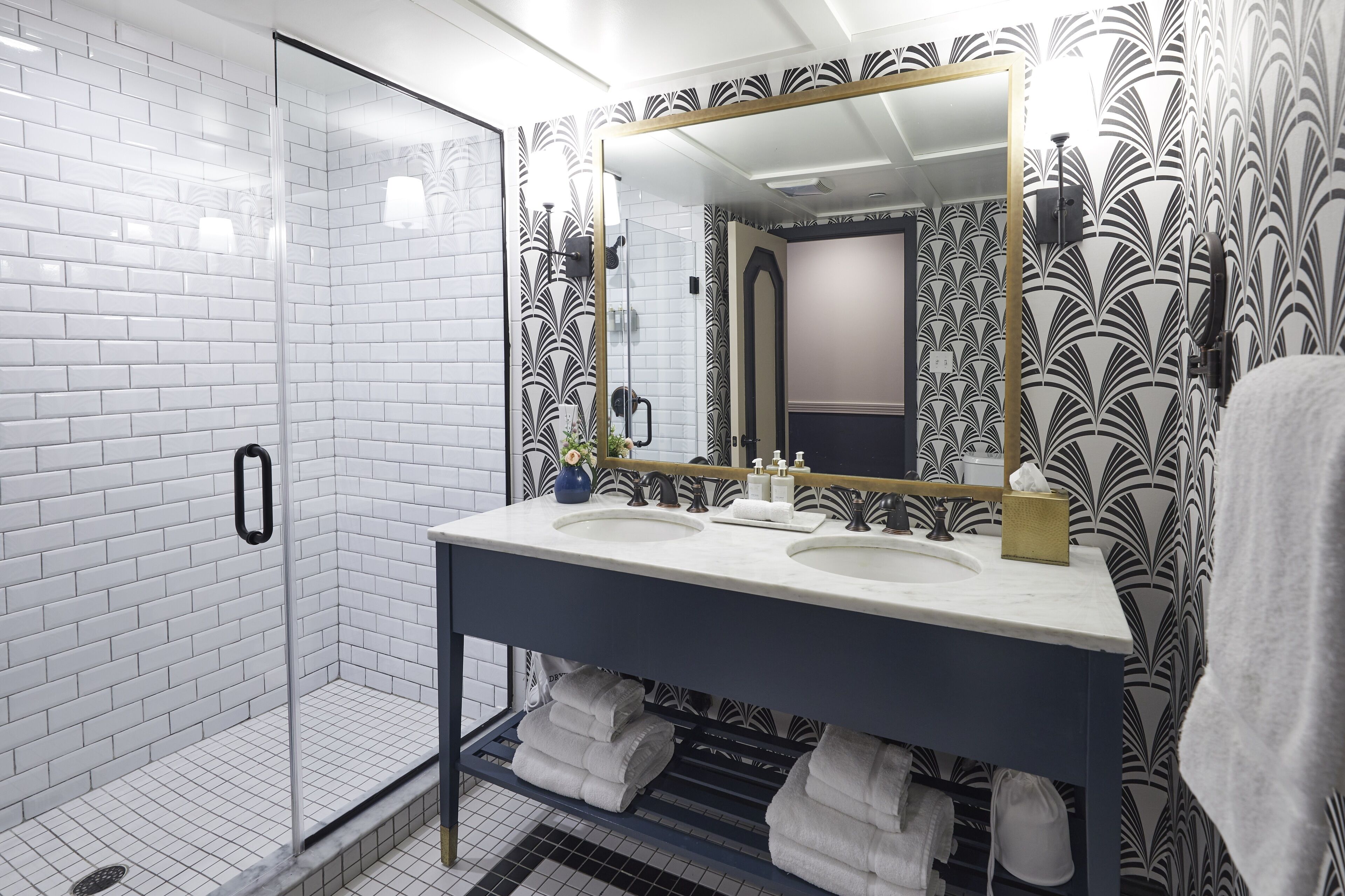 designer toiletries, hair dryer, bathrobes, towels