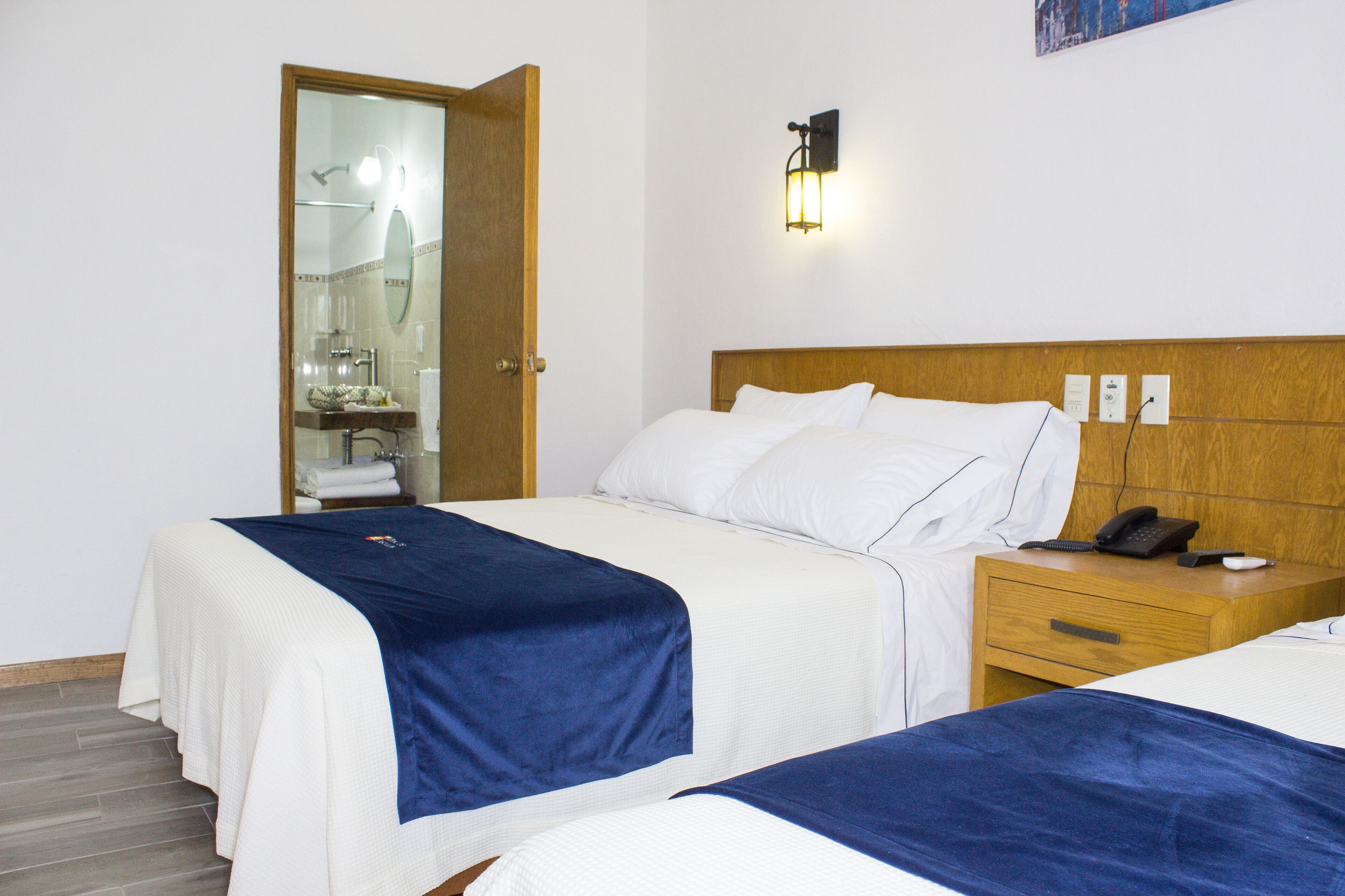 room, 2 queen beds | desk, free wifi, bed sheets