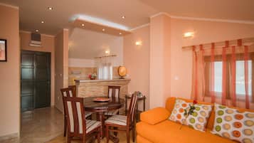 Comfort House | Living area | 40-inch TV with cable channels