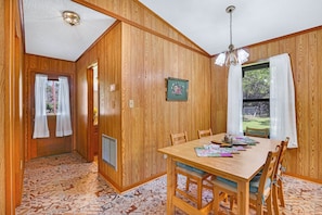 Inside of the entry door coming from the carport.  When you enter, the first bathroom is on the left and the first bedroom is on the right. - Charming 2 bedroom house in the heart of Downtown Wimberley! Walk to the Square! (Wimberley)